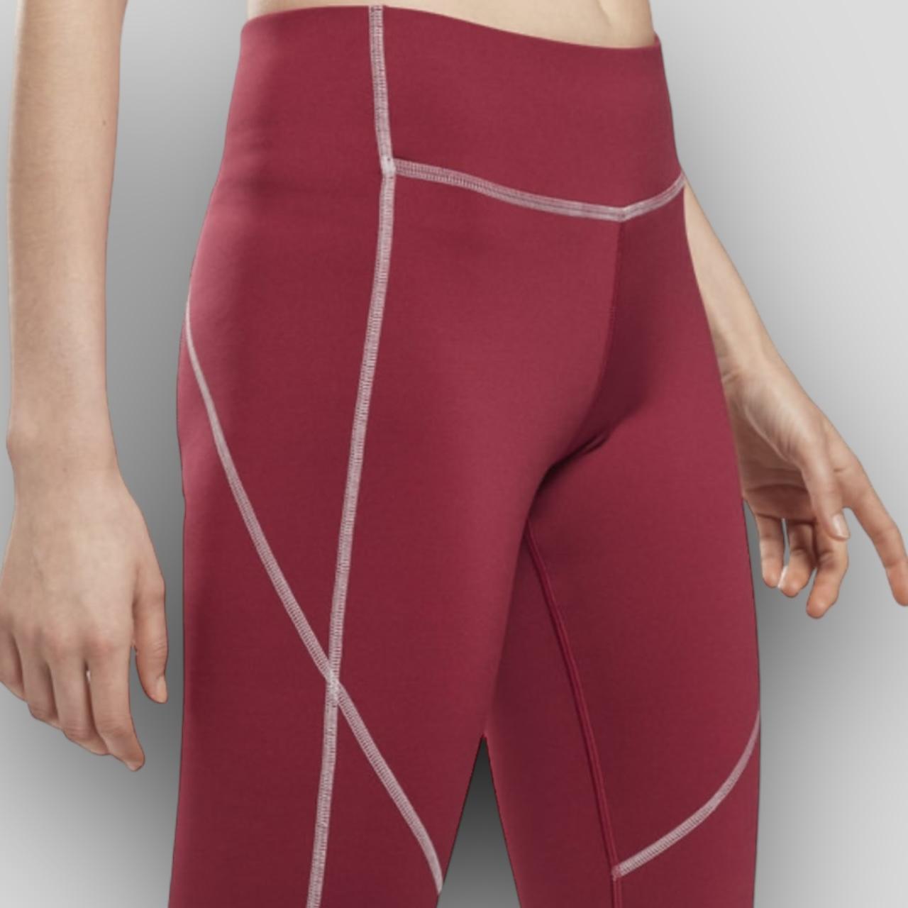 Leggings Reebok burdeos y blancos para mujer