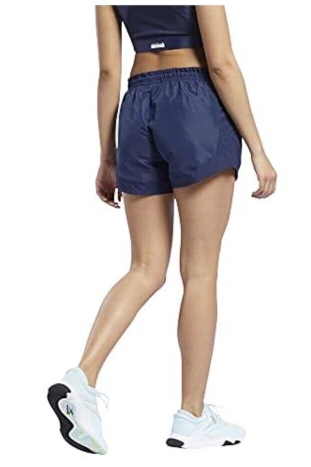 Short para correr tejidos brillantes para mujer Core 10 de Reebok